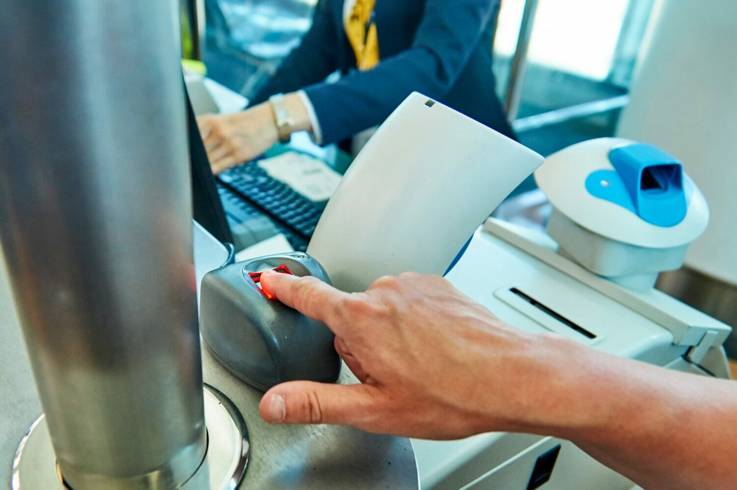 Immigrant has their biometrics taken by USCIS