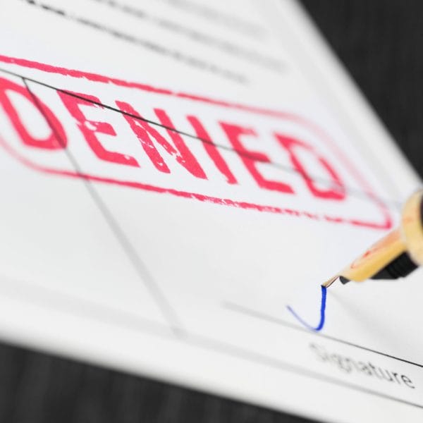 A green card application is denied.
