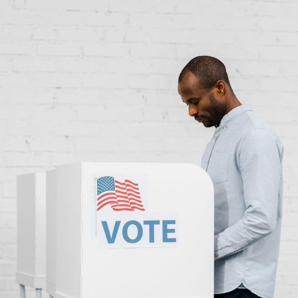 An immigrant casts his vote in the the U.S. presidential election.