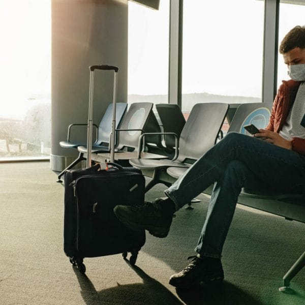 A traveler flying to the U.S. during Covid