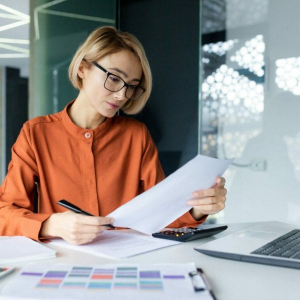 Employer filling out work visa paperwork