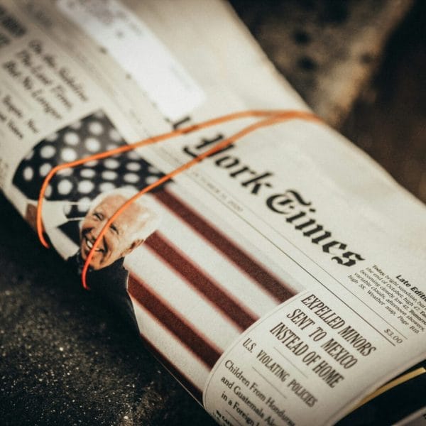 Photograph of newspaper with Joe Biden