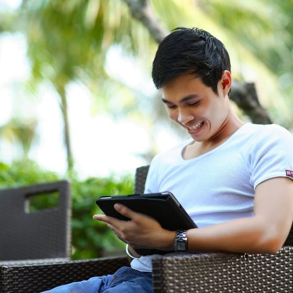 Man looking at his iPad