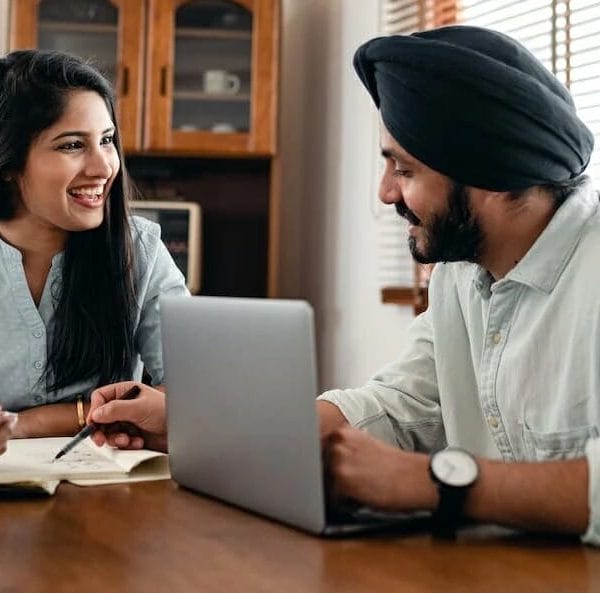Immigrant working with team remotely
