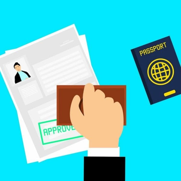 Official stamps an immigration visa application form.