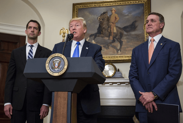 Senator Tom Cotton (R-AR), President Donald Trump, and Senator David Perdue (R-GA)